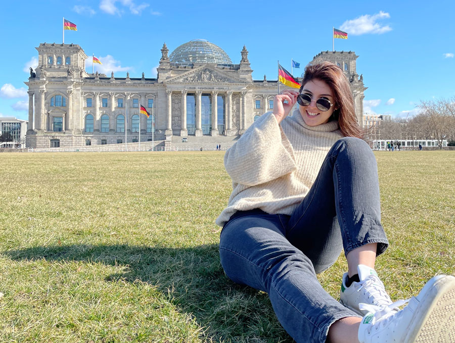 Aine Ford in front of a German building